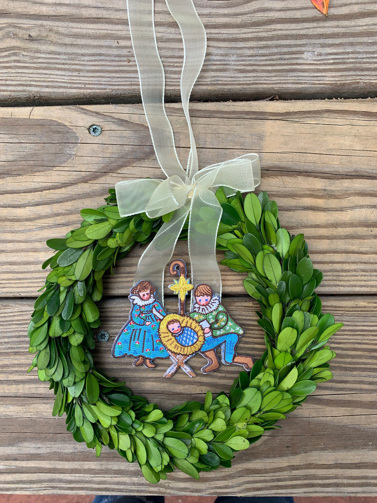 Embroidered Nativity Ornament in Preserved Laurel Wreath